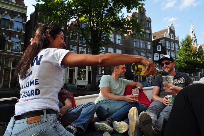 Amsterdam Open Boat Cruise with Live Guide and Two Drinks - The cruise route: Hermitage area to the Canal Ring highlights