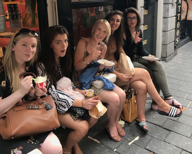 Amsterdam: Red Light District and Local Pub Tour - Inside the district without the performance: narrow streets, peep shows, and the story behind it