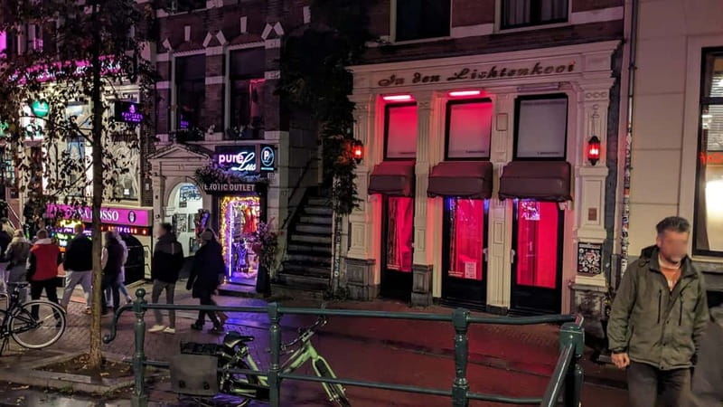 Amsterdam: Red Light District Tour - Dam Square to Warmoesstraat: seeing the neighborhood’s “why” up close