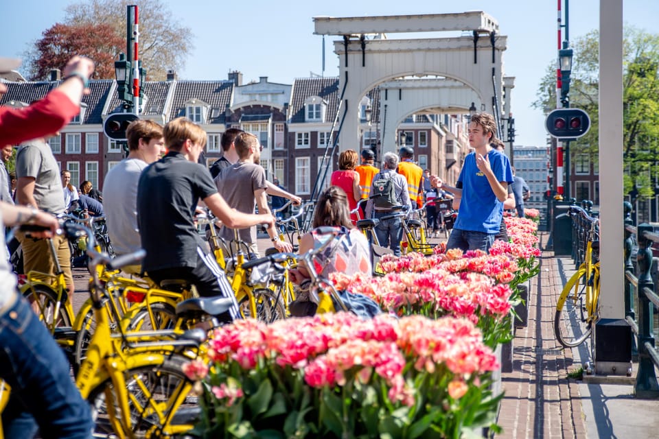 Amsterdam: Relaxed City Highlights Guided Bike Tour - Herengracht Return and the Final Sweep Back Toward Central