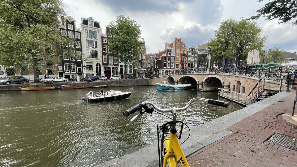 Amsterdam: Relaxed City Highlights Guided Bike Tour - The Jordaan Quarter: Leasurely Cycling Through a Neighborhood You Can Feel