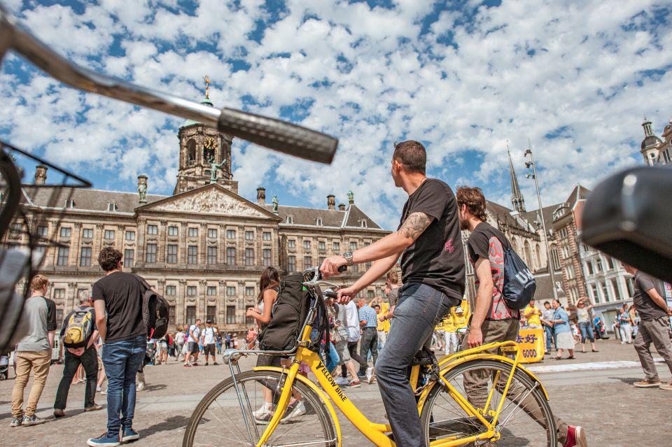 Amsterdam: Relaxed City Highlights Guided Bike Tour - Leidseplein: Music, Squatting, and Crime History in One Compact Stretch