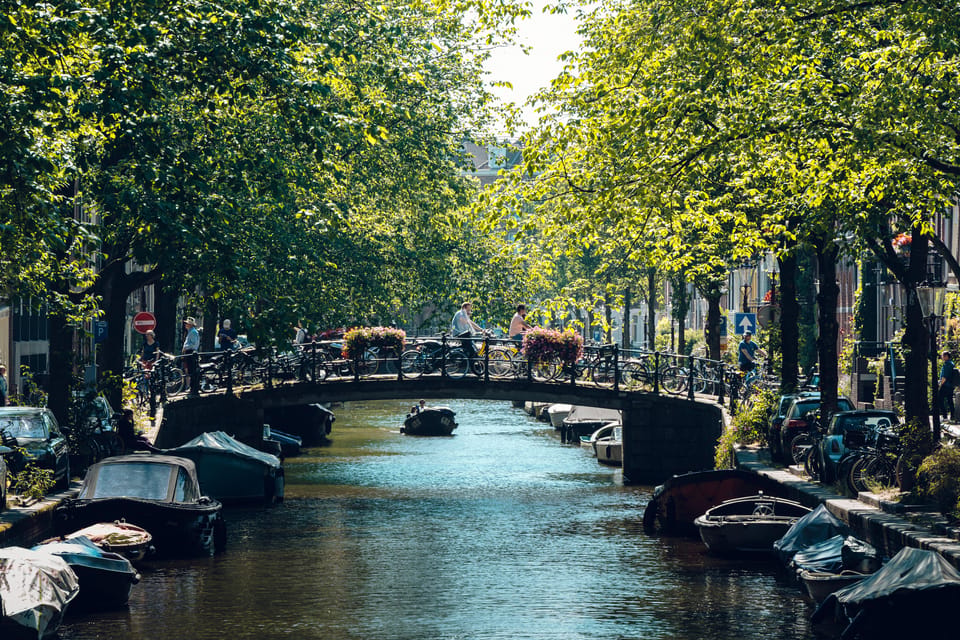 Amsterdam: Relaxed City Highlights Guided Bike Tour - Museumplein and P.C. Hooftstraat: Art District Energy and Luxury-Adjacent Charm