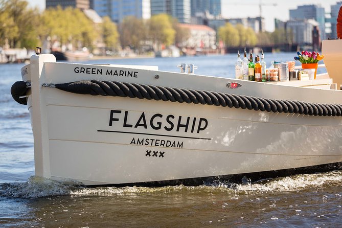 Amsterdam: Saloon Boat Cruise + Unlimited Drinks & Bite option - The Stopera area: Dutch National Opera and Ballet from the canal