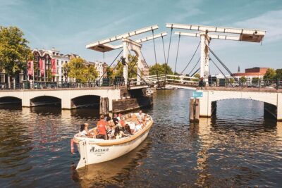 Amsterdam: Saloon Boat Cruise + Unlimited Drinks & Bite option - Why the Amstel cruise is a smart first stop in Amsterdam