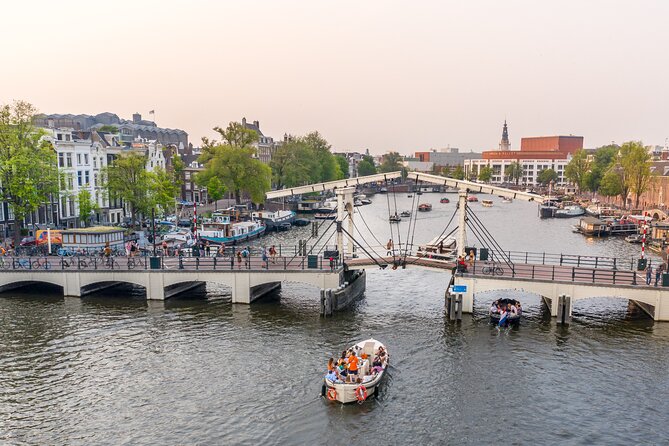 Amsterdam: Saloon Boat Cruise + Unlimited Drinks & Bite option - The UNESCO canal ring: why you keep seeing concentric belts