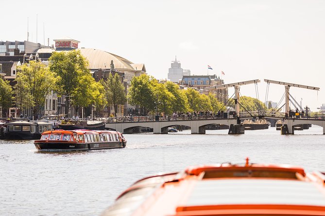 Amsterdam Sightseeing Canal Cruise with Audio Guide - Big landmark passes: Anne Frank House, Westerkerk, and Magere Brug
