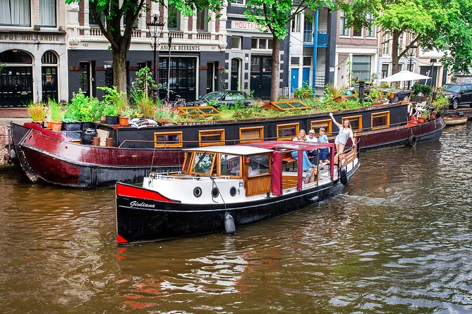 Amsterdam Small-Group Canal Cruise With Dutch Snacks and Drink - Westerkerk and the “most famous church” moment from the canal