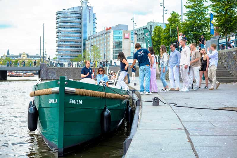 Amsterdam: The Newest Canal Cruise with Drink Option - Electric Boat Comfort: Covered Seating and Weather Reality