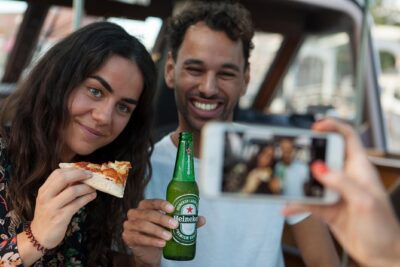 Amsterdam The Original Pizza Cruise with Unlimited Drinks - The canal route: Centraal Station, Jordaan, UNESCO canals, and more