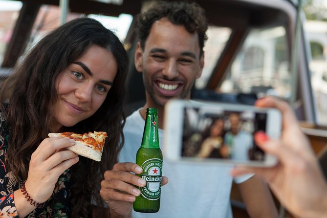 Amsterdam The Original Pizza Cruise with Unlimited Drinks - The canal route: Centraal Station, Jordaan, UNESCO canals, and more