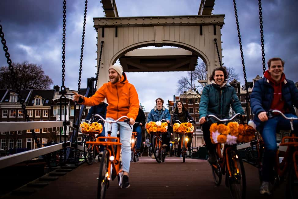 Amsterdam: Top Highlights Guided Bike Tour EN/DE/ES/FR/IT/CN - Stop-by-stop: from the Jordaan’s canals to the Anne Frank House