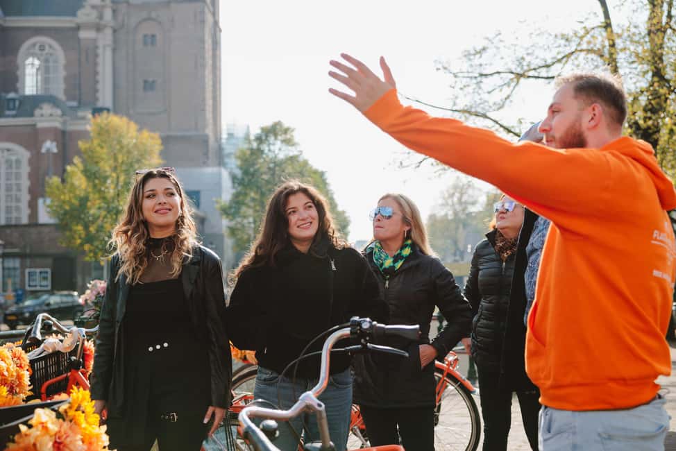 Amsterdam: Top Highlights Guided Bike Tour EN/DE/ES/FR/IT/CN - Meeting at Nieuwezijds Voorburgwal 101: easy to find, easy to start