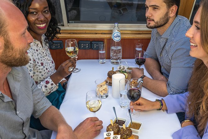 Amsterdam Wine and Cheese Evening Cruise - A Calm 75 Minutes on Amsterdam’s Lit Canals