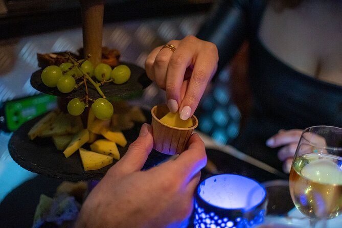 Amsterdam Wine and Cheese Guided Evening Cruise - The Old City Nodes: Nieuwmarkt, Waag, and the Floating Flower Market