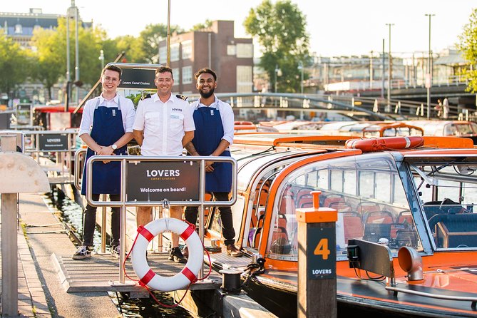 Dinner Canal Cruise Amsterdam: 4-Courses Including Drinks - Central Station and the city’s big silhouettes at night