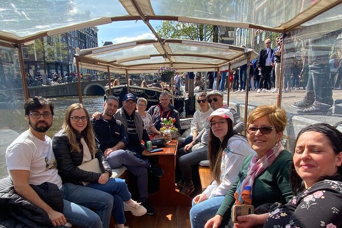 Dutch Cheese & Drinks Guided Amsterdam Boat Tour, All Inclusive - From Pierre Cuypers to Amsterdam’s view debates: the Neo-Renaissance station