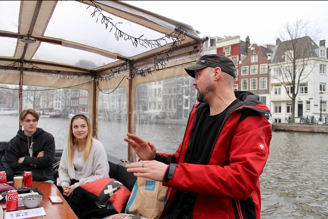 Dutch Cheese & Drinks Guided Amsterdam Boat Tour, All Inclusive - Monks, merchants, and the Oude Kerk’s story in the Red Light District