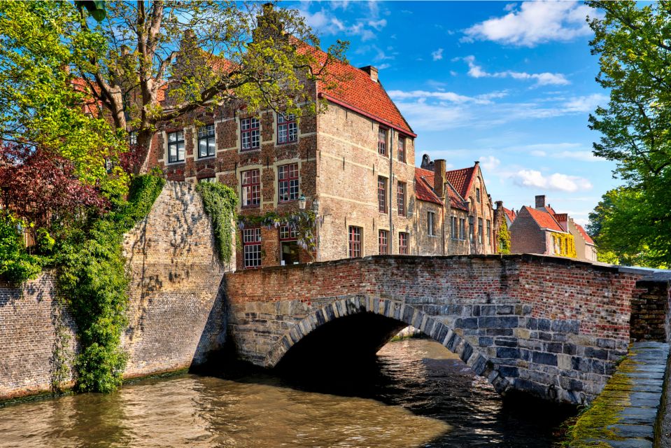 From Amsterdam: Bruges Day Trip in English with Boat Option - Djiver canal and the cobbled lanes: where the city feels real