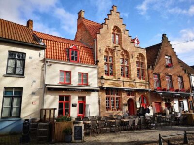 From Amsterdam: Bruges Day Trip in Spanish with Boat Option - Getting There: The Bus Ride That Can Make or Break the Day