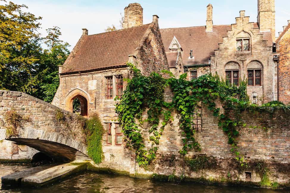 From Amsterdam: Day Trip to the Charming Brussels and Bruges - Bruges walking route: canals, bridges, and picture-perfect moments