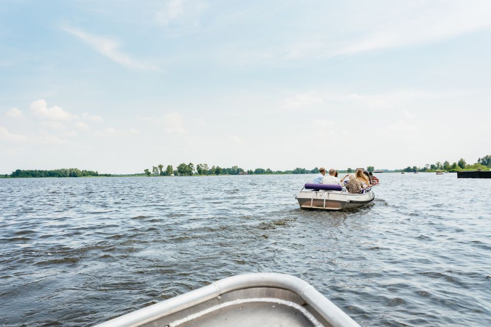 From Amsterdam: Giethoorn & Zaanse Schans Tour w/ Small Boat - The IJsselmeer pass: a quick reset before Giethoorn