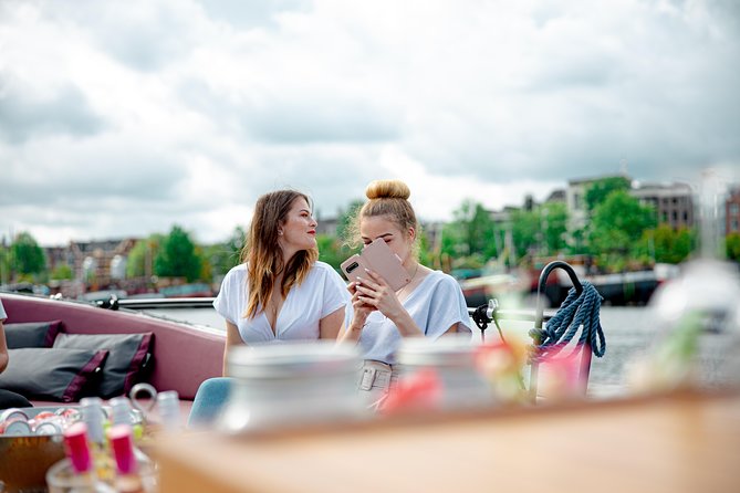 Guided Amsterdam Canal Cruise – Snacks & Drinks on board(1 Hour) - From medieval walls to modern snacks: drinks, Dutch cheese, and what to bring