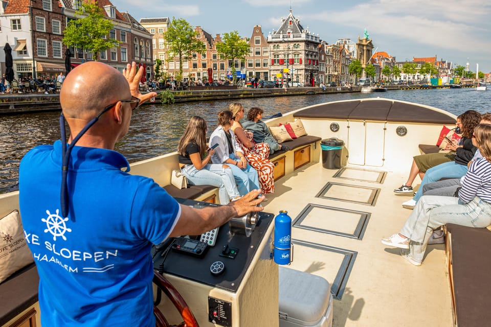 Haarlem: Guided Highlights Canal Cruise on Open Boat - The electric sloop: quiet power, open views, and built-in comfort