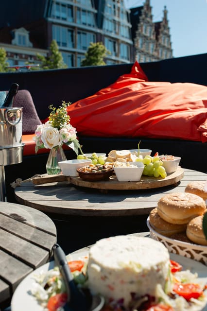 Haarlem: Sightseeing Boat Tour with Snacks and Drinks - Getting to Nieuwe Gracht 80 and boarding the XXX10
