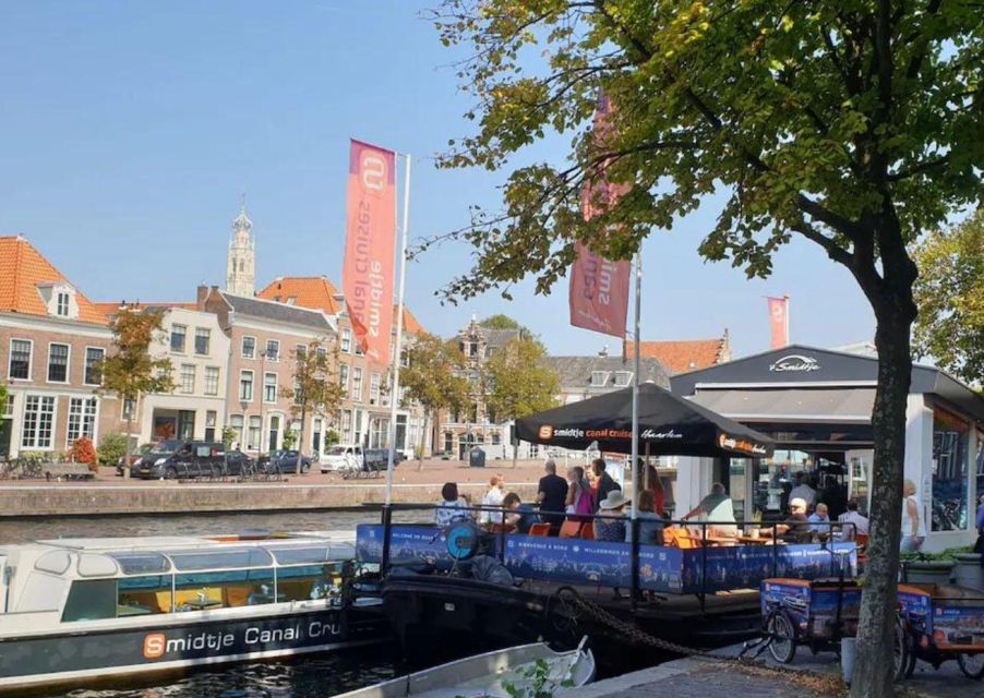 Haarlem: Sightseeing Canal Cruise through the City Center - Jopenkerk and Stadsschouwburg: buildings with personalities