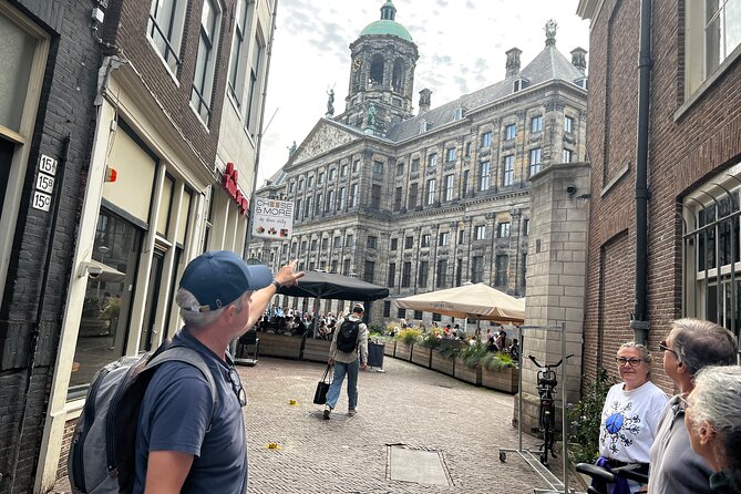 Small Group Walking Tour in Amsterdam with Friendly and Fun Guide - From Dam Square to a Canal City: The Big Idea Behind This Walk