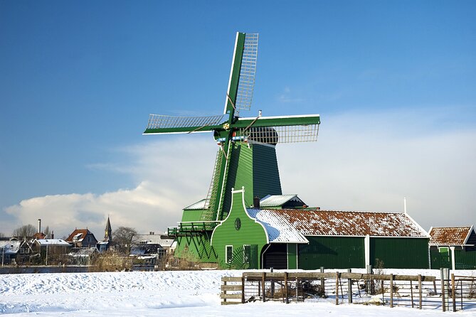 Zaanse Schans and Cheese Tasting Guided Tour from Amsterdam - Getting There: Stationsplein 4 and Staying Found in a Crowd