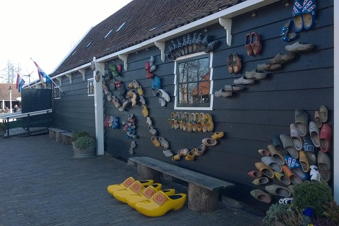 Zaanse Schans Windmills, Clogs and Dutch Cheese Small-Group Tour from Amsterdam - Molen De Kat Paint Mill: Wind-Powered Pigments and a Climbable View
